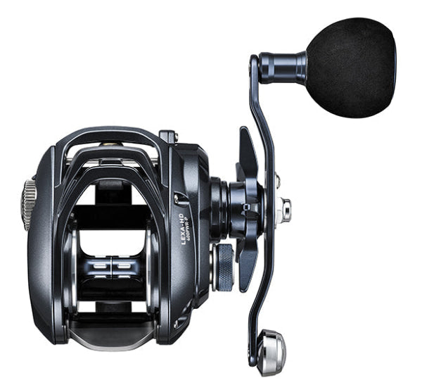 A black and dark gray baitcasting fishing reel with a black foam wind guard, shown from a three-quarters angle on a solid white background.