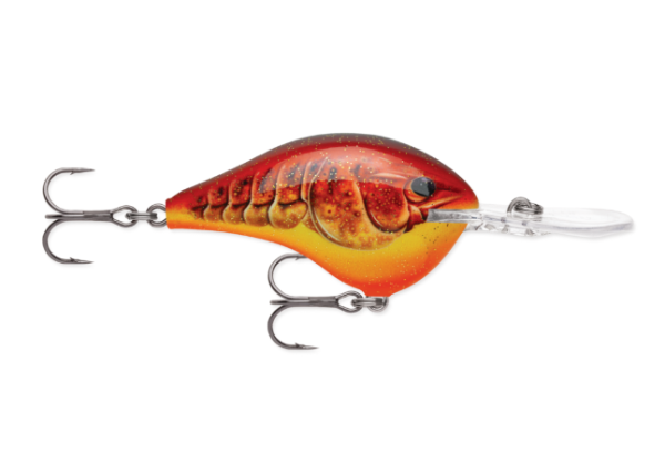 Detailed red and orange crawfish fishing lure with two treble hooks.