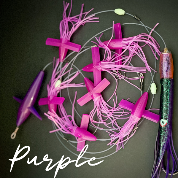 Purple fishing lures on a dark surface with 'Purple' text.