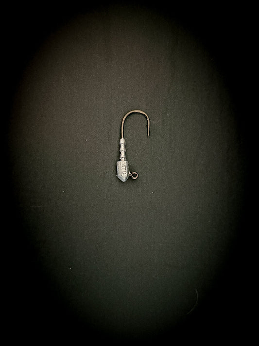Fishing hook with a sinker on a dark background