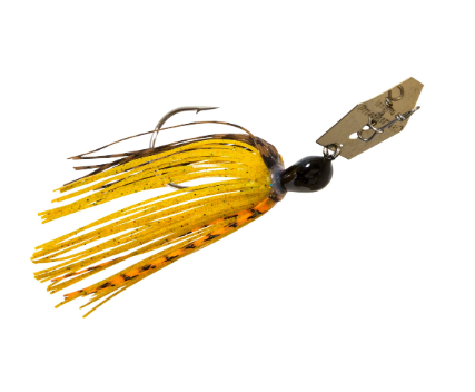 A fishing jig lure with a yellow and orange skirt, a black bead head, and a gold-toned metal blade, shown on a plain white background.