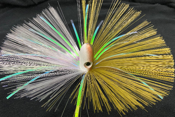 Fishing lure with multicolored fibers on a black background