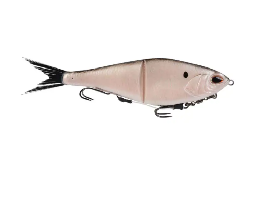 Pale segmented fishing lure with black tail, red eyes, and two treble hooks.
