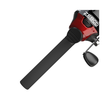 Close-up of a red and black Zebco fishing reel with a long black handle.