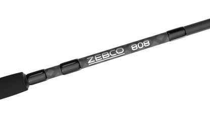 Angled black Zebco 808 fishing rod with white text and subtle pattern.