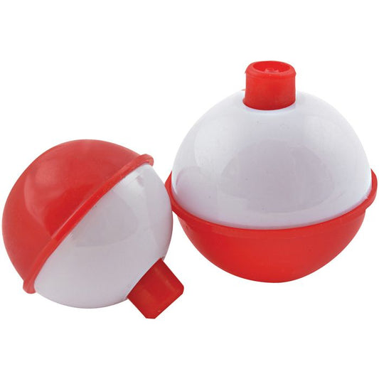 Two red and white spherical fishing bobbers on a white background.