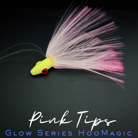 Fishing lure with pink tips on a dark background, featuring the brand 'HooMagic'.