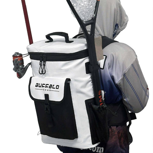 White and black cooler bag with fishing rod and tackle, attached to a backpack on a person.