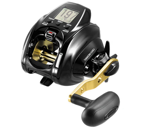 A black baitcasting fishing reel with a gold handle and a digital display screen, shown against a solid white background.