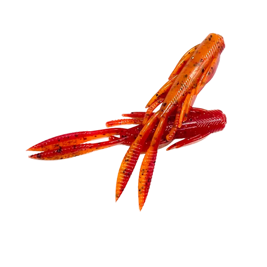 Orange and red fishing lure on a white background