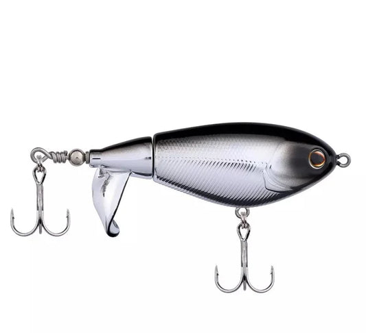 Black and chrome fishing lure with a front propeller and two treble hooks.