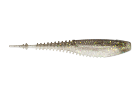 A translucent soft plastic fishing lure shaped like a small shrimp or bait, shown horizontally against a plain white background. The lure has a ribbed body with fine glitter and iridescent flecks.