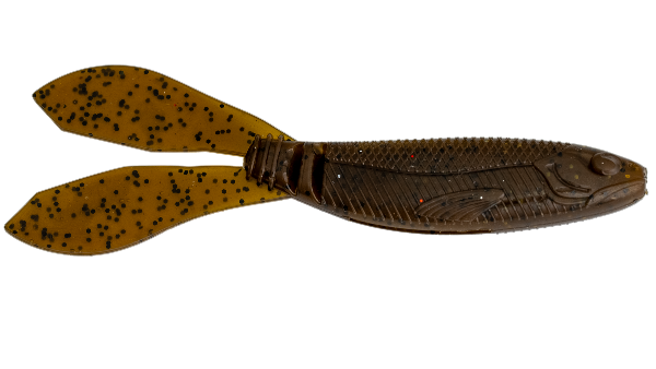 A soft plastic fishing lure shaped like a small fish with two paddle-like tails, shown on a plain white background. The body is dark brown with a scaled texture and small red glitter flecks, while the tails are translucent amber-brown with black speckles.