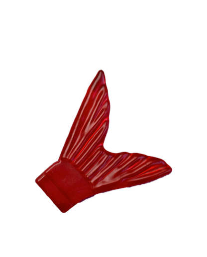 Red plastic fish tail with a unique design on a white background