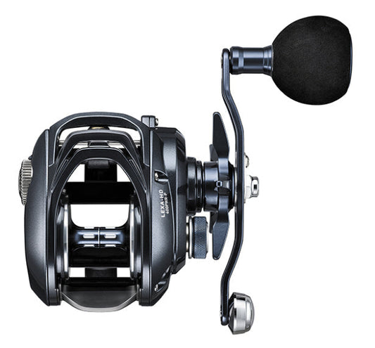 A black and dark gray baitcasting fishing reel with a black foam wind guard, shown from a three-quarters angle on a solid white background.