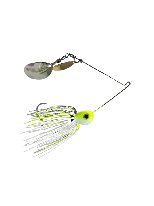 Fishing spinner lure with a white and green design on a white background