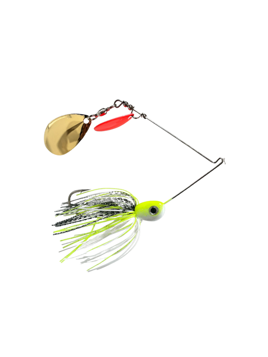 Fishing lure with gold blade, red and green skirt on a white background
