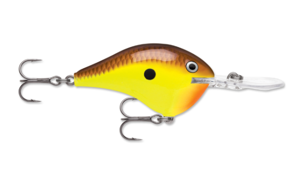 Brown, chartreuse, and orange fishing lure with two silver treble hooks.