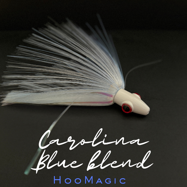 Fishing lure with 'Carolina Blue blend' text on a dark background
