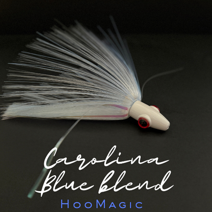 Fishing lure with 'Carolina Blue blend' text on a dark background