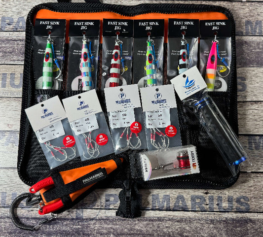A black zippered carrying case laid flat on a rustic wood surface, holding multiple packaged Palmarais Jig fishing lures and accessories. Visible items include several Jig lures in different color combinations, a clear tube, a red-and-orange hand tool, hooks, and a small boxed component.