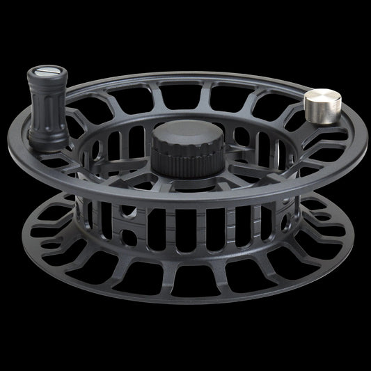 Black fly fishing reel on a white background