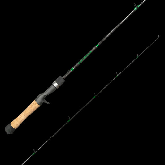A fishing rod shown on a plain white background, with the handle and part of the rod visible in a diagonal layout. The rod is primarily black with green accents, a cork-textured tan grip, and small silver details.