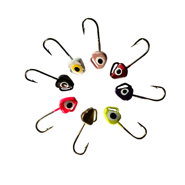 Eight fishing jig hooks arranged in a circular pattern on a solid white background, featuring various eye colors and metallic head finishes.