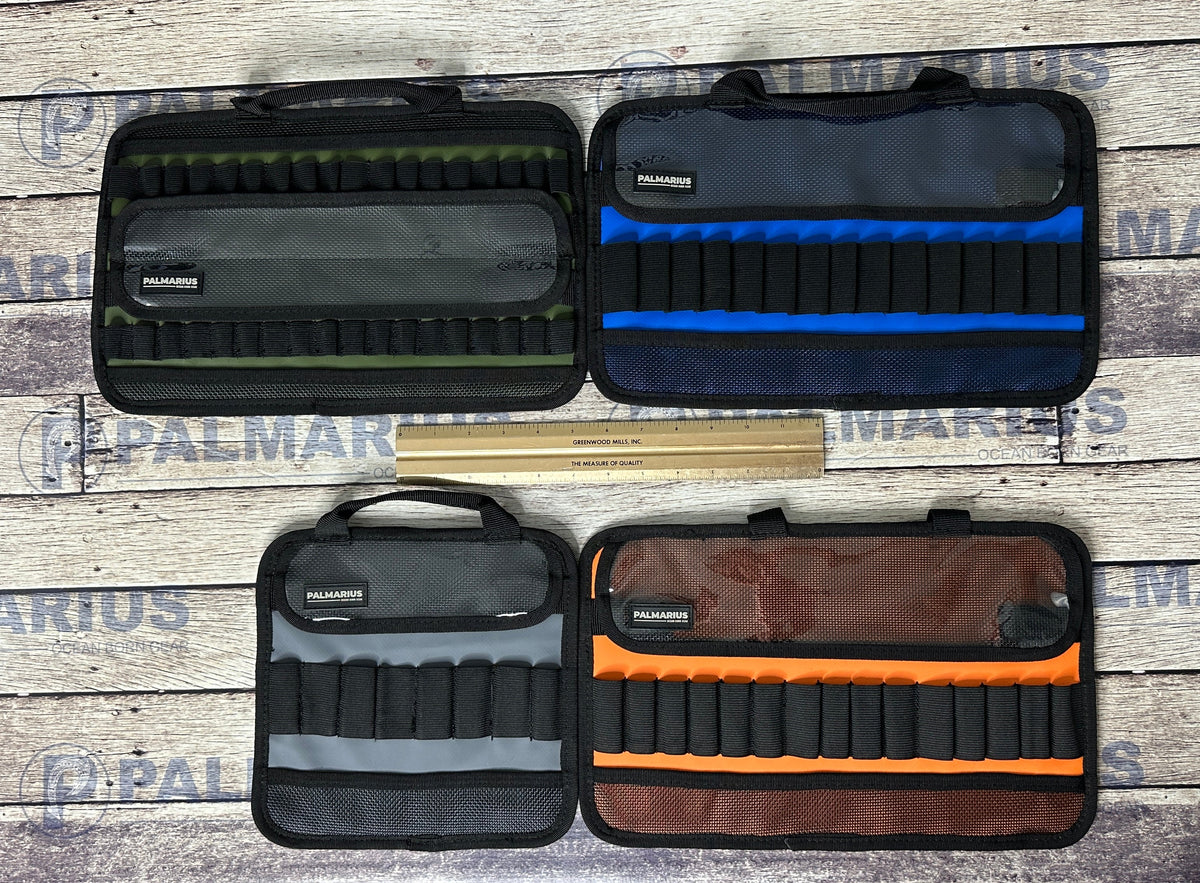 Four Palmaris brand gun case organizer sleeves displayed flat on a rustic wood background, showing different color options: black with olive green, black with blue, black with gray, and black with orange.
