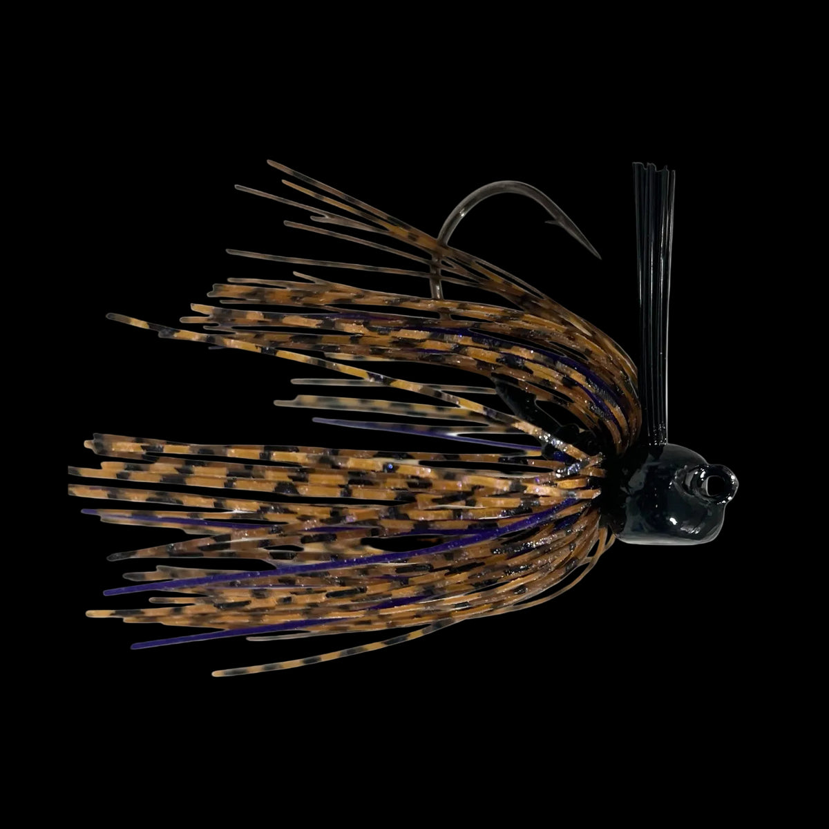 Fishing lure with black and brown color pattern on a white background
