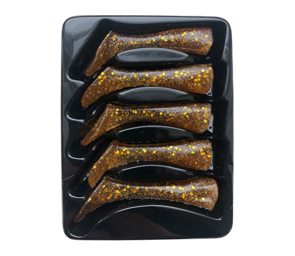 Set of five glittery brown fishing lures in a black holder on a white background