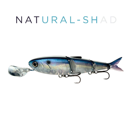 Fishing lure resembling a shad on a white background with 'NATURAL-SHAD' text.