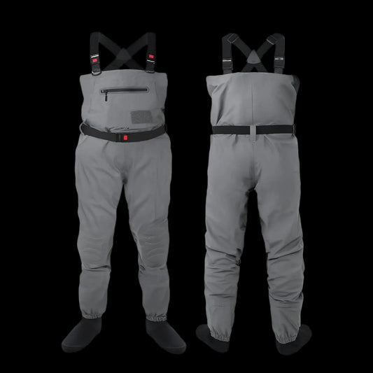 Gray dry waders shown from both the front and back views, featuring black suspenders, a black belt, and black foot coverings, set against a plain white background.