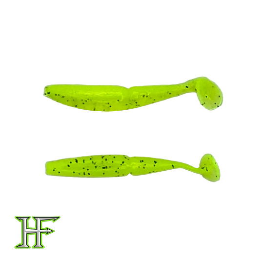 Two green fishing lures with black speckles on a white background, featuring the HF logo.