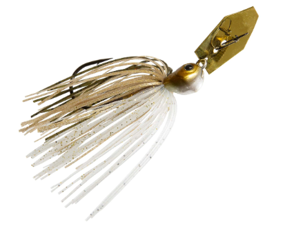 A fishing jig lure with a metallic gold blade, a gold and white head, and a skirt made of white and beige glittery strands, isolated on a white background.