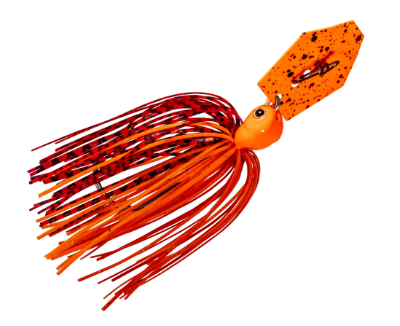 An orange and red paddle tail fishing lure with a speckled orange top and red-and-black skirt, isolated on a white background.