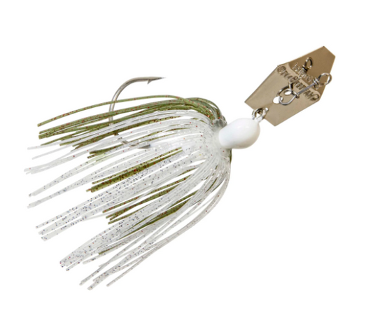 A jig fishing lure with a white bead head, olive green and white glitter skirt, a silver treble hook, and a gold-colored brand tag on a plain white background.