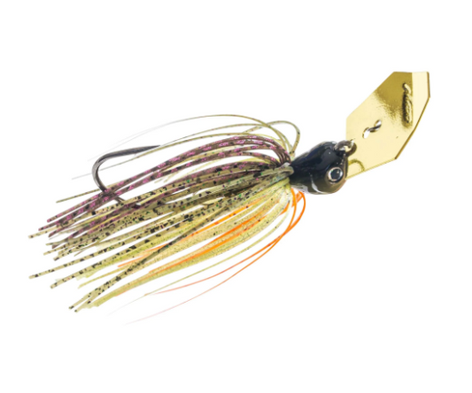 A fishing jig lure with a gold metal blade, a black head, and multi-colored skirt strands in beige, green, orange, and purple, shown on a plain white background.