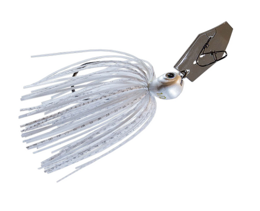 A silver metal jig fishing lure with a white skirt and a dark metal tag, shown on a plain white background.