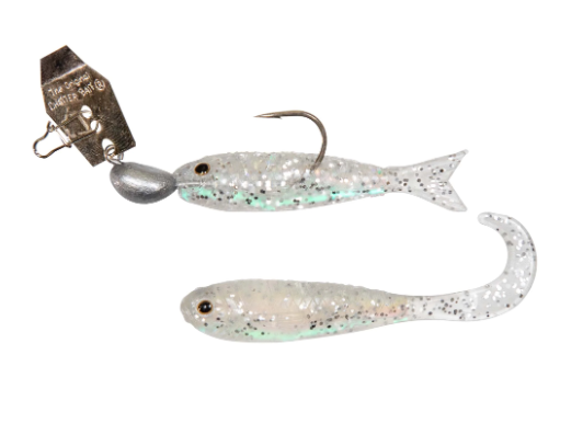 A soft plastic fishing lure shaped like a small fish, shown with a metal spinner blade and hook. The lure body is translucent white with fine glitter and iridescent green-blue flecks, on a plain white background.
