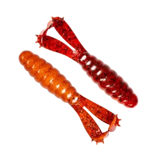 Two soft plastic fishing lures on a plain white background, one in translucent orange-brown and the other in translucent red with dark glitter.