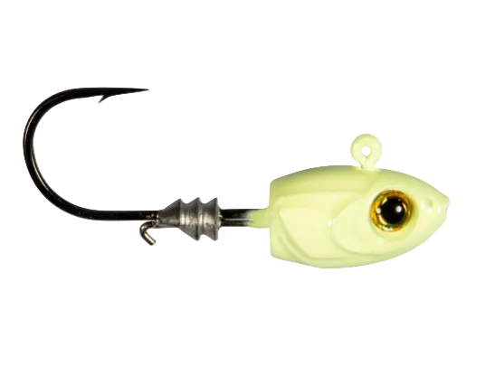 A fishing jig lure with a pale yellow-green body, realistic eye, and a black metal hook, shown on a plain white background.
