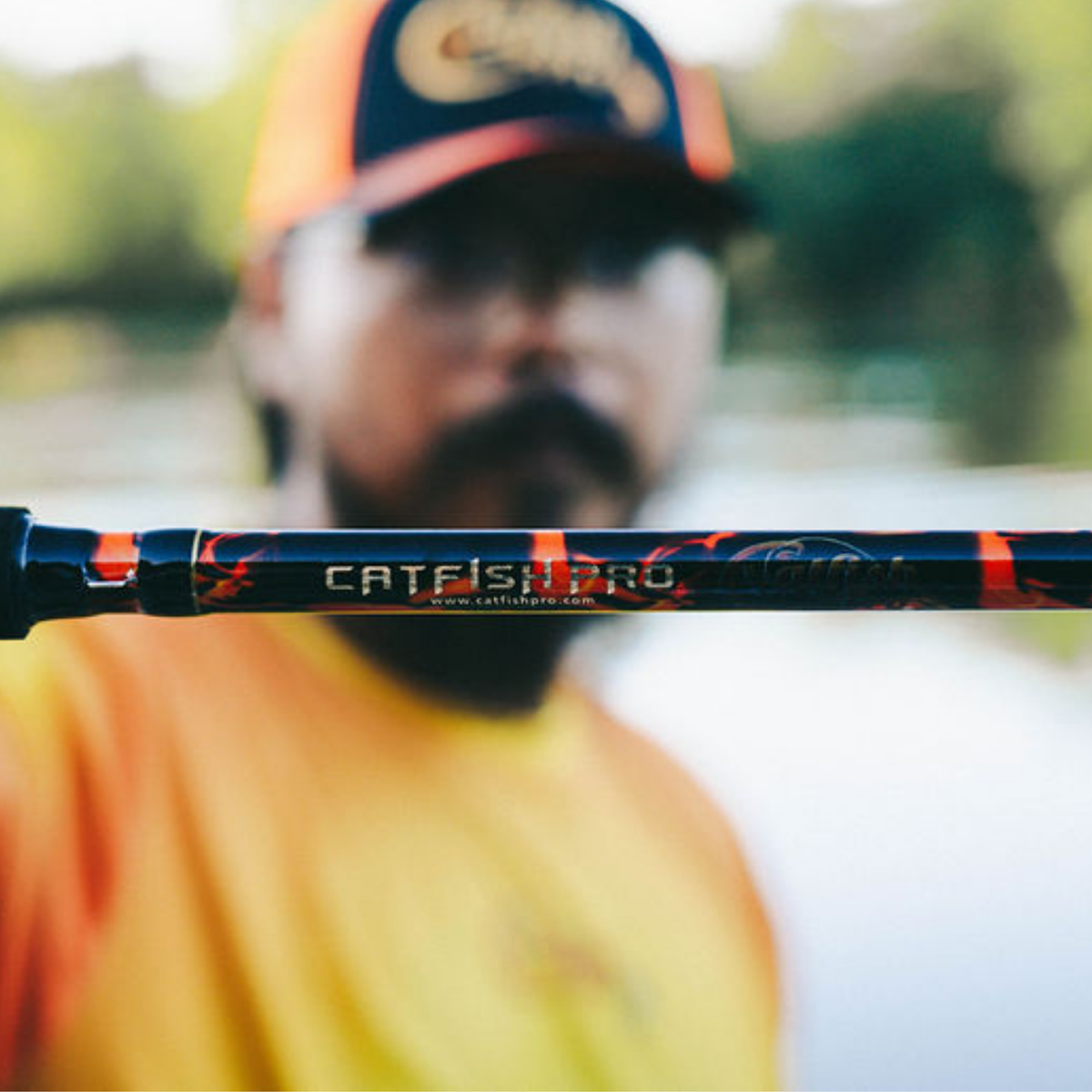 Catfish Pro Black Dragon Fire Spinning Glow Rod | 7'6"