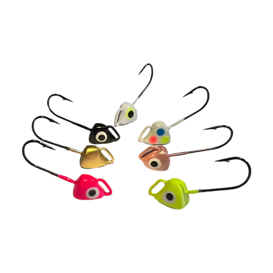 Six fishing lures with large round eyes and split hooks, shown on a plain white background. The lures come in multiple colors including pink, gold, black, white, copper, and neon yellow-green.