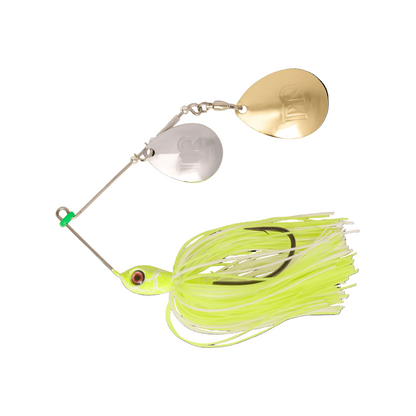 Spinnerbait with gold and silver blades and a bright green skirt on a white background