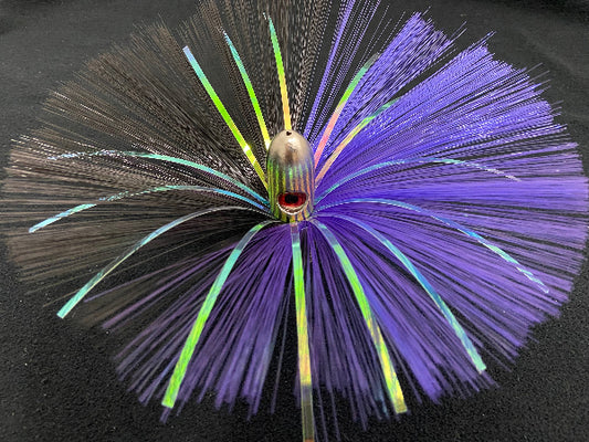 Fishing lure with multicolored fibers on a black background