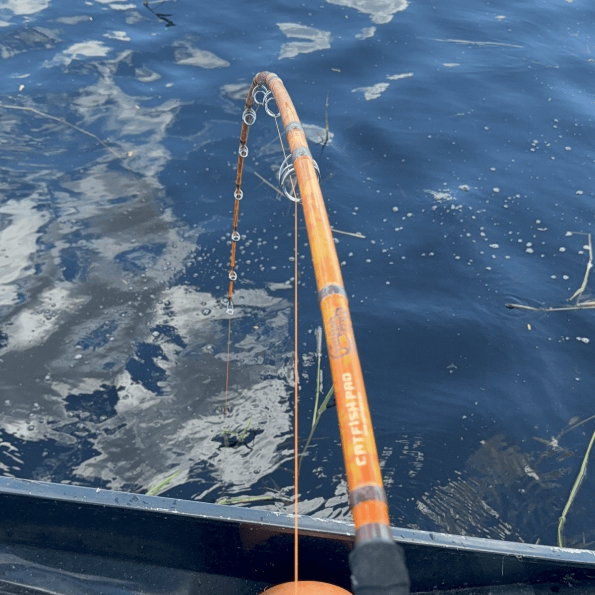 Catfish Pro Orange Dragon Fire Spinning Glow Rod | 7'6"