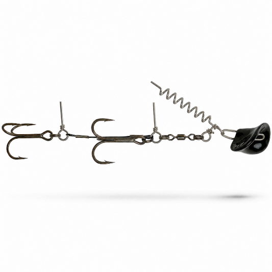 A fishing jig head with three treble hooks, a coiled spring, and a black lip, shown against a plain white background.
