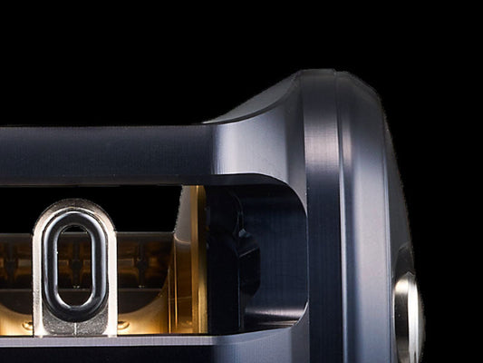 Close-up of a metallic object with a black background